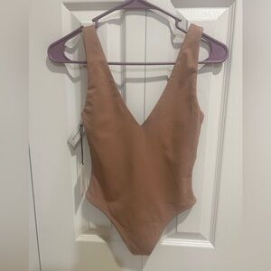 NWT Babaton ContourToasty Cahud Bodysuit Deep V size XS beautiful nude color